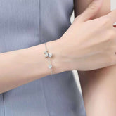 Furry Friend's Sparkle: Sterling Silver Dog & Diamond Bracelet